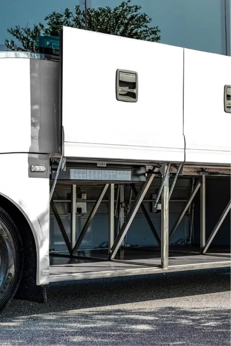 Open underfloor luggage bay on the Van Hool CX45