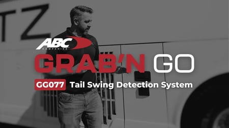 ABC Companies technician demonstrating a motorcoach blind-spot and tail-swing detection sensor
