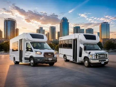 Two white Embassy Element composite shuttle buses on Ford Transit and Ford E-450 chassis